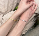 Matching snake bracelets