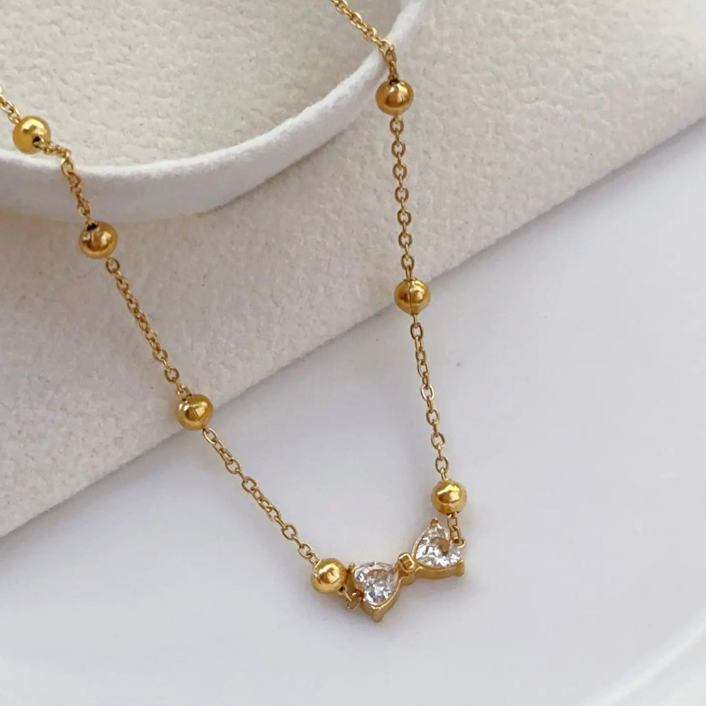 Rhinestone bow necklace