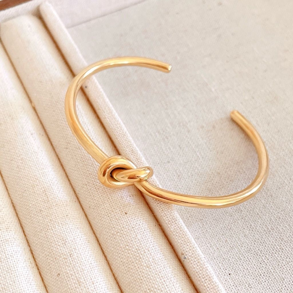 Golden knot cuff