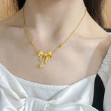 Bow drop necklace