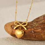 Golden love bow necklace