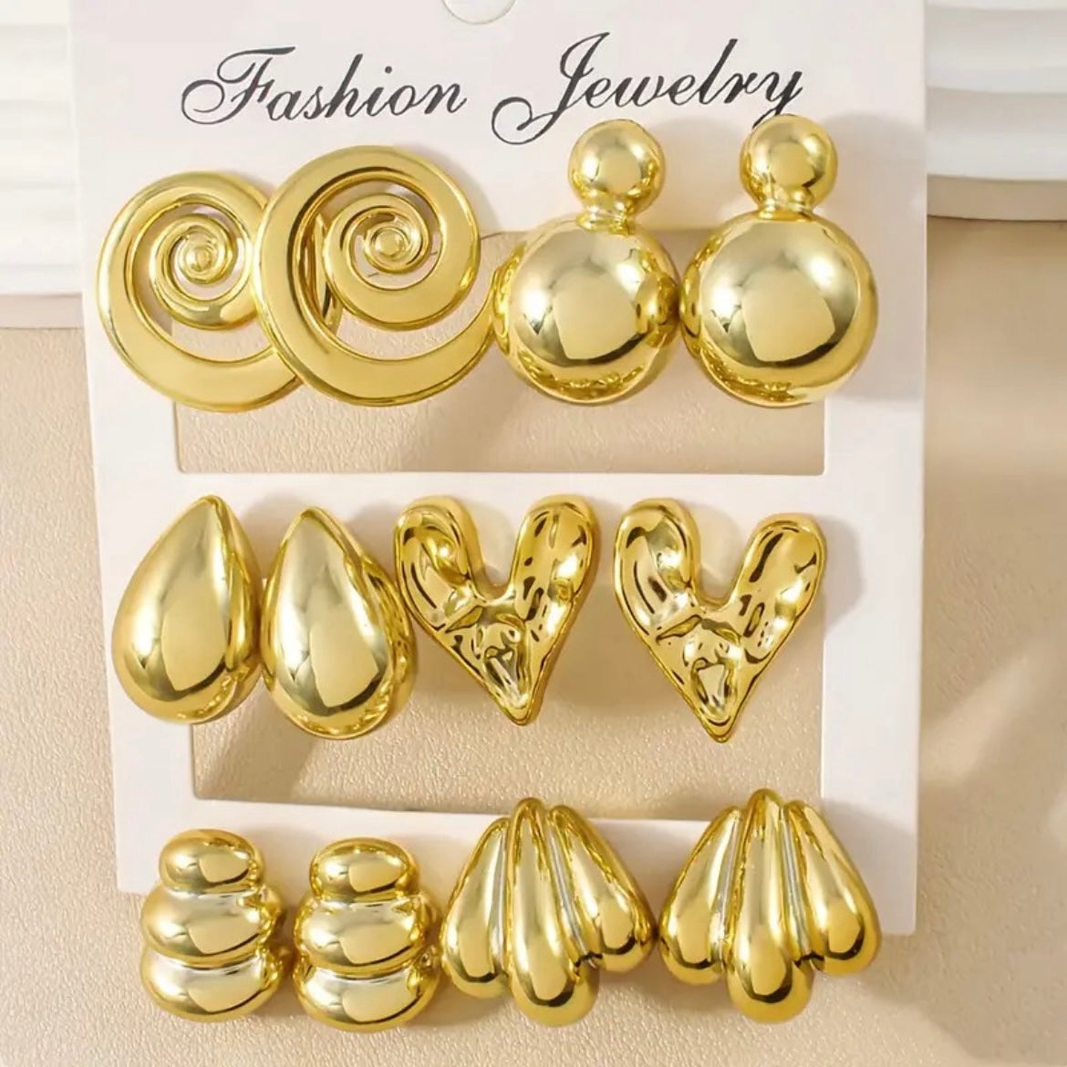 6 pair of chunky earrings