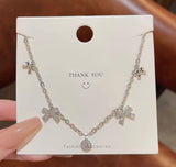 Silver ribbon rhinestone necklace