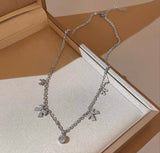 Silver ribbon rhinestone necklace