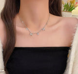 Silver ribbon rhinestone necklace