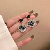 Black rhinestone heart earrings